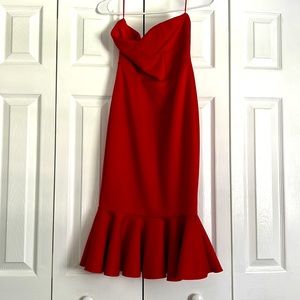 Festive and flattering red strapless mermaid tail cocktail dress. Stunning red.